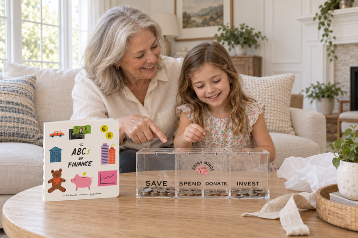 A grandparent and child discovering the board book and clear acrylic money bank as a gift